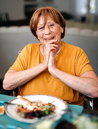 Senior woman with a healthy meal