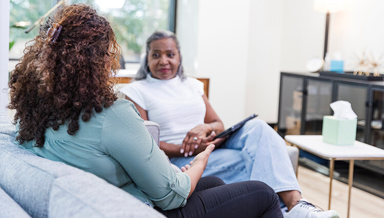 Senior woman with Seasonal Affective Disorder chatting during herapy